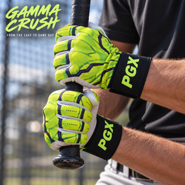 Gamma Crush batting gloves gripping a bat with wide black PGX wrist straps